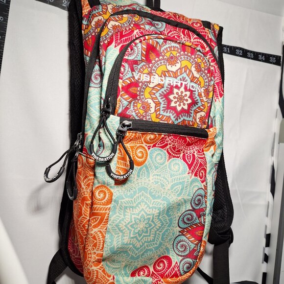 Vibedration Hydration Backpack w/o bladder -turquoise/orange pattern - Used